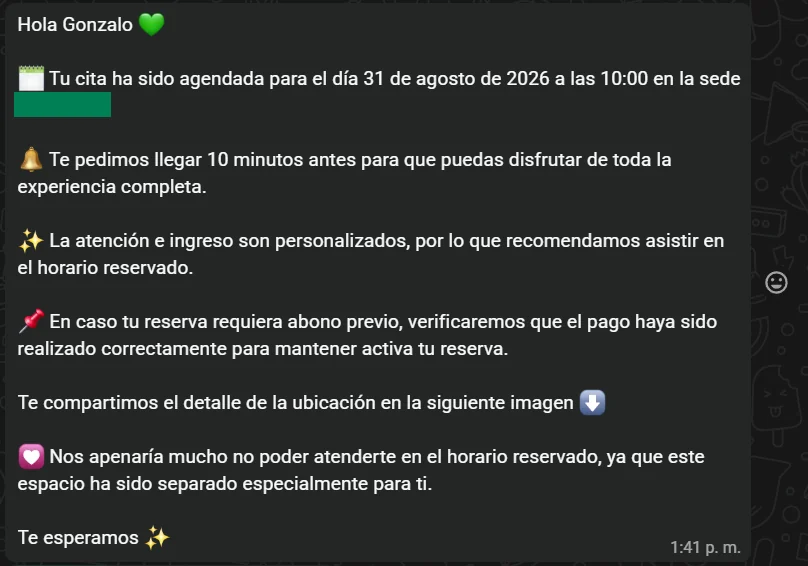 Mensaje de WhatsApp que confirma la cita agendada con fecha, hora y sede
